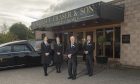 Three generations of family funeral business William T Fraser and Son.   William Fraser, his son Martin and grand daughters Emily and Francesca . Images Jason Hedges/DC Thomson