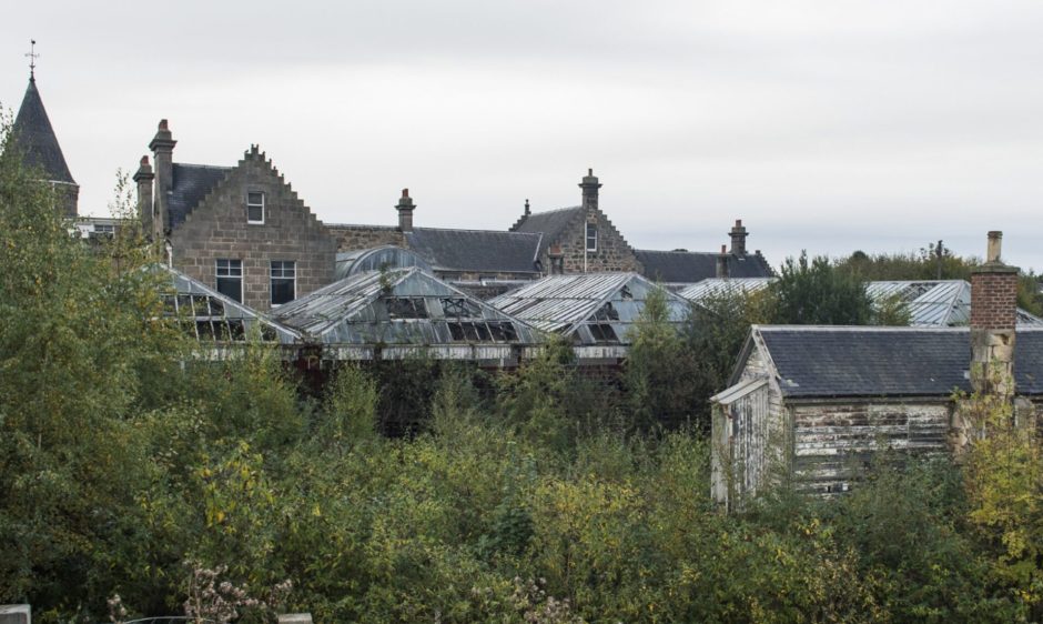 Looking across railway to old station. 