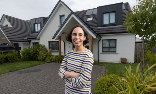 Joana Lindbom-Gomes, pictured, says her energy efficient home is saving her a fortune on heating bills.