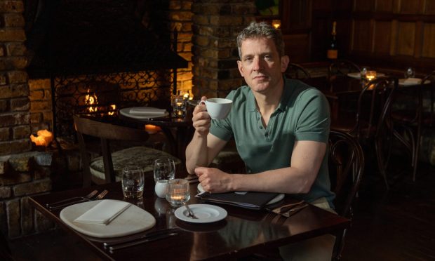 Andy Morton enjoying his own company in Cafe Boheme. The Aberdeen bistro is top-ranked in the UK for best solo dining. Image: Kenny Elrick/DC Thomson