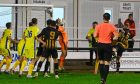 Ross Still, right, heads home Huntly's second goal in their Evening Express Aberdeenshire Cup semi-final win against Buckie Thistle. Pictures by Kenny Elrick/DCT Media.