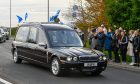 Alex Salmond's body arriving in Fraserburgh after landing at Aberdeen Airport this afternoon.