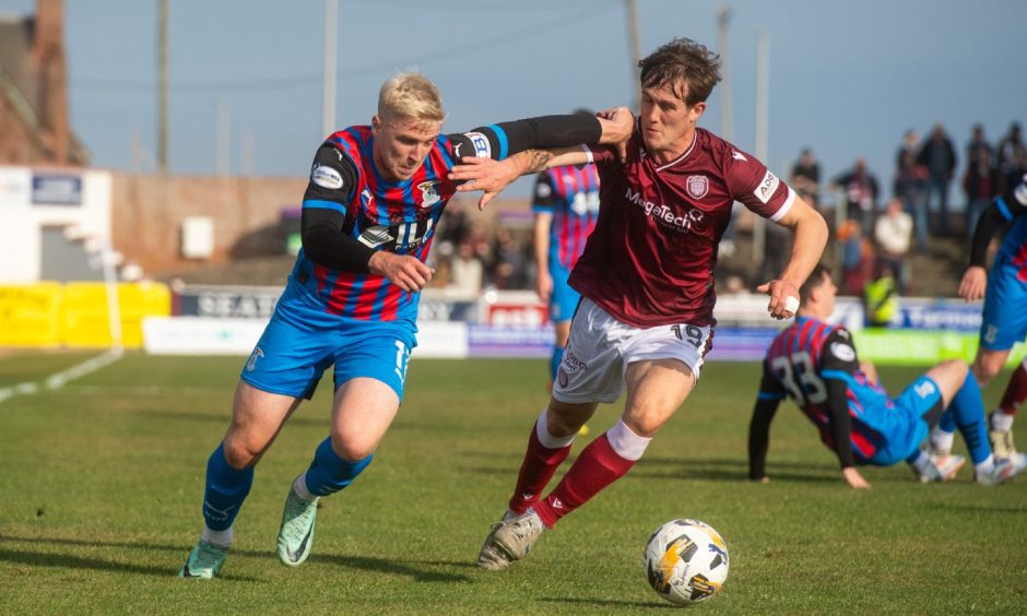 Caley Thistle's Luis Longstaff and Arbroath's Brynn Sinclair compete for the ball during the teams' meeting in October at Gayfield, which ended in a 1-0 win for the Angus team.