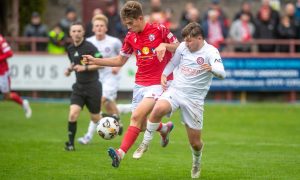 Brechin City's Michael Hunter, left, is challenged by James Wallace of Brora Rangers. Pictures by Kath Flannery/DCT Media.