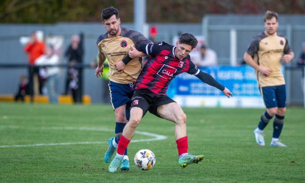 CR0050454  Callum Law. Aberdeen.  Harlaw Park. Scottish Cup second round: Inverurie Locos v Dundee North End.
Picture Shows Jay Halliday and North End's Brian Clark.
Saturday 26th October 2024 
Image: Kath Flannery/DC Thomson