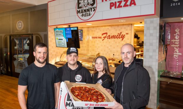 Franchise holders Krisztian Schlachta and Bianka Lutteroty with Calum Wright (left) and Phil Adams (right) of Big Manny's. Image: Kami Thomson/DC Thomson