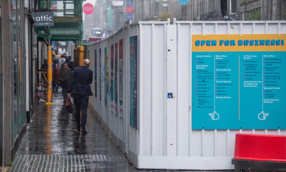 Union Street open for business campaign poster on the hoardings erected in Aberdeen city centre.