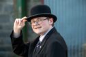 Teenager Charlie Elphinstone who works at Strichen Antiques, and has a museum in his home. 
Image: Kami Thomson/DC Thomson