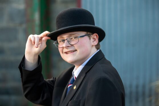 Teenager Charlie Elphinstone who works at Strichen Antiques, and has a museum in his home. 
Image: Kami Thomson/DC Thomson