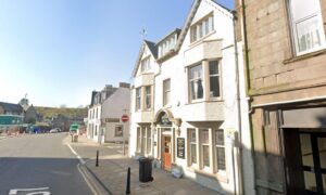 New signs have gone up in the hotel's window advertising its sale. Image: Google Maps