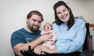 Proud parents Lucy and Tommy with their new baby girl.