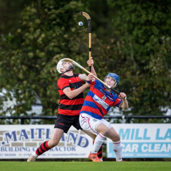 Oban's Gregor Macdonald (left) with James Falconer (Kingussie). Image: Neil G Paterson.