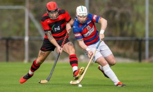 Oban's Daniel Cameron with Rory MacKeachan (Kingussie). Image: Neil Paterson.