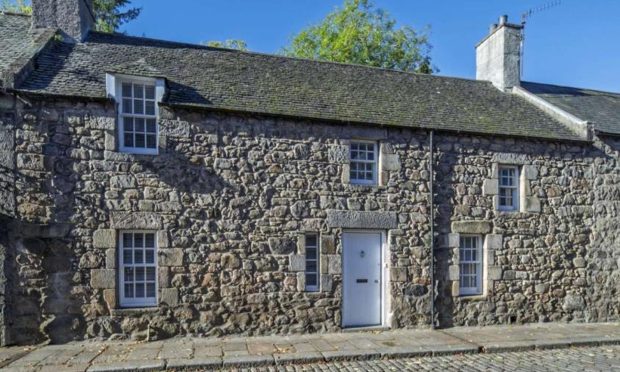 The cottage is located just outside the grounds of Aberdeen University. Image: Savills.