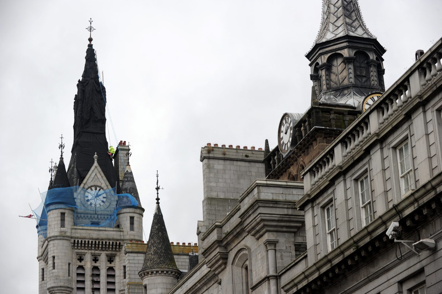 Steeplejacks were rushed in to look at the Town House roof after pieces of it fell onto the street below in 2013. Image: Kenny Elrick/DC Thomson