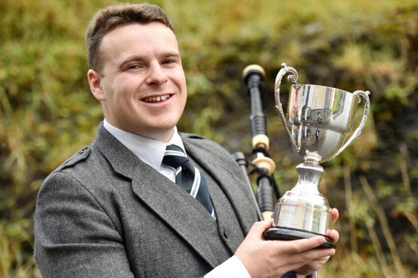 John Dew of Crieff and Glasgow with the John T. MacRae Cup