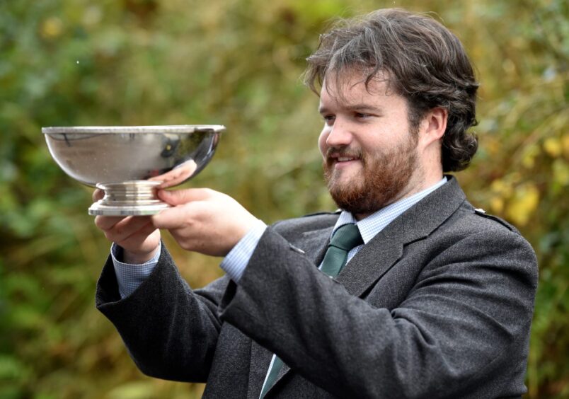 Angus MacPhee of Inverness with the James R. Johnstone Memorial Trophy