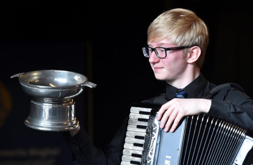 Fraser Donaldson of Kinmylies and a pupil of Charleston Academy, Inverness with the Smith Mearns Trophy