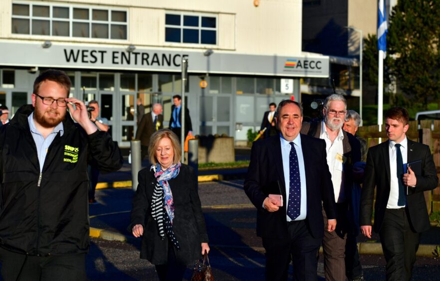 Alex Salmond was pictures leaving Aberdeen's former AECC venue in 2017 smiling despite losing his Westminster seat during the UK Parliamentary Election.