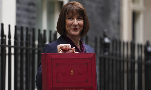 Chancellor Rachel Reeves leaves 11 Downing Street, London, with her ministerial red box before delivering her Budget. Image: PA.