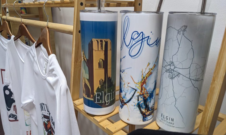 Elgin merchandise on shelves. 