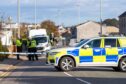 Police at Morriston Road in Elgin. Image: Jasperimage.