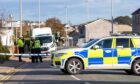 Police at Morriston Road in Elgin. Image: Jasperimage.