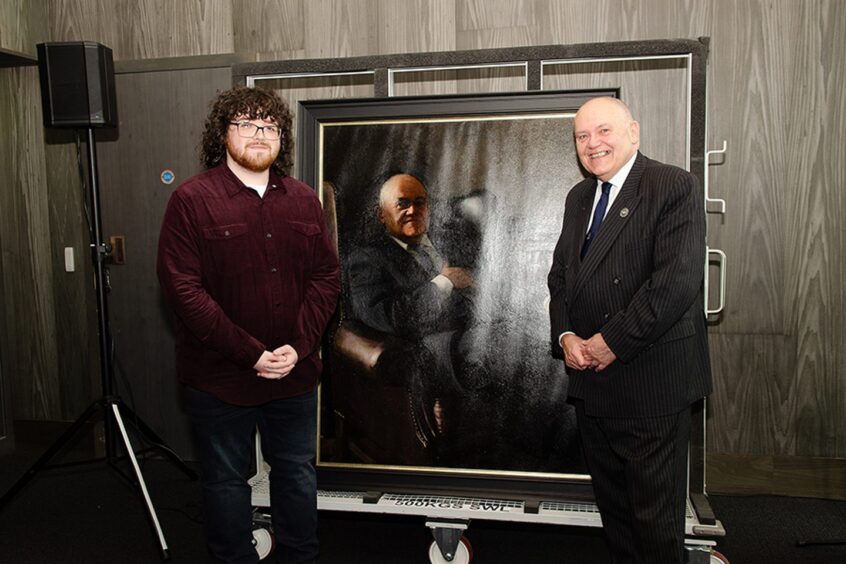 Brodie Wilson with former Lord Provost Barney Crockett and his provostal portrait. Image: Aberdeen City Council