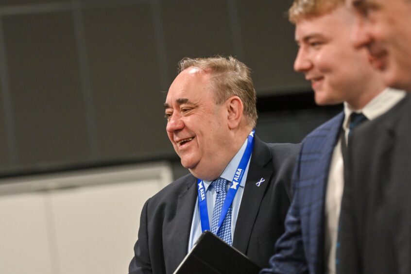 AlexSAlmond pictured smiling during an election count at P&J Live.