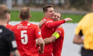 Brora Rangers' Colin Williamson, second from right, celebrates with Michael Finnis after scoring the winning goal against Formartine United in the Scottish Cup. Pictures by Jasperimage.