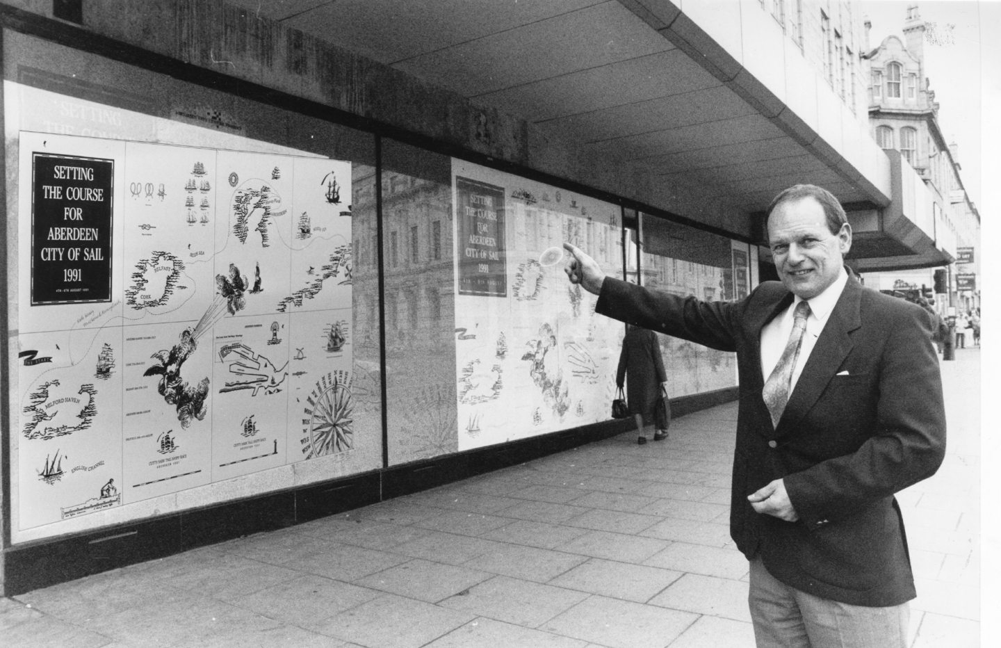 Aberdeen businessman John Michie with one of the Union Street windows heralding the Tall Ships Race