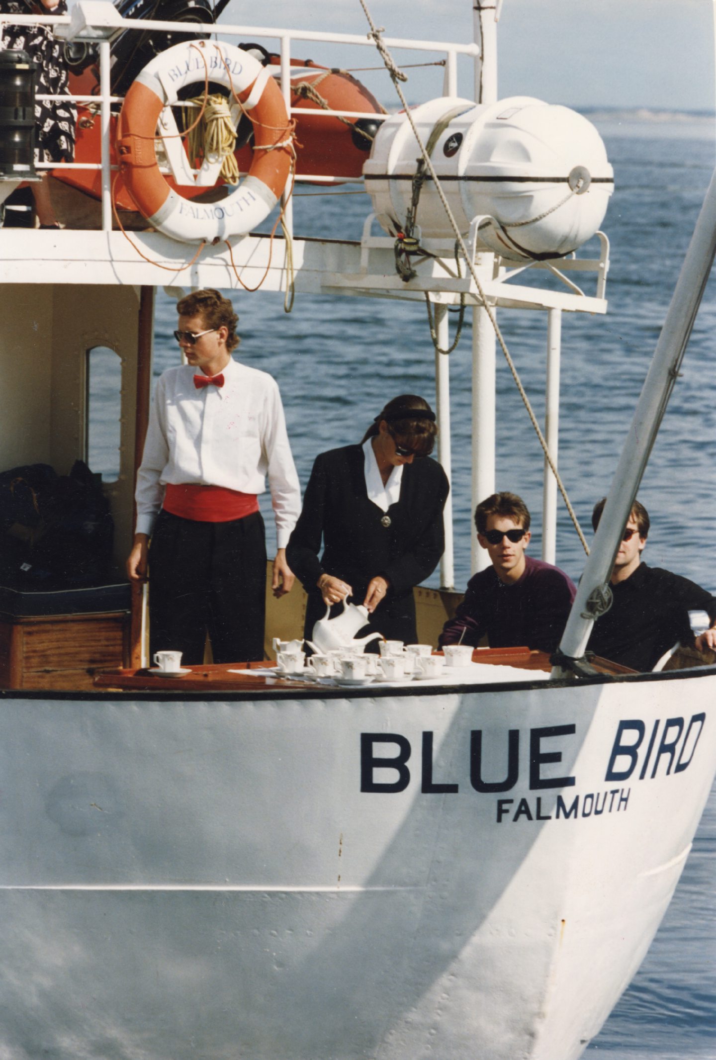 Passengers on the Blue Bird having tea