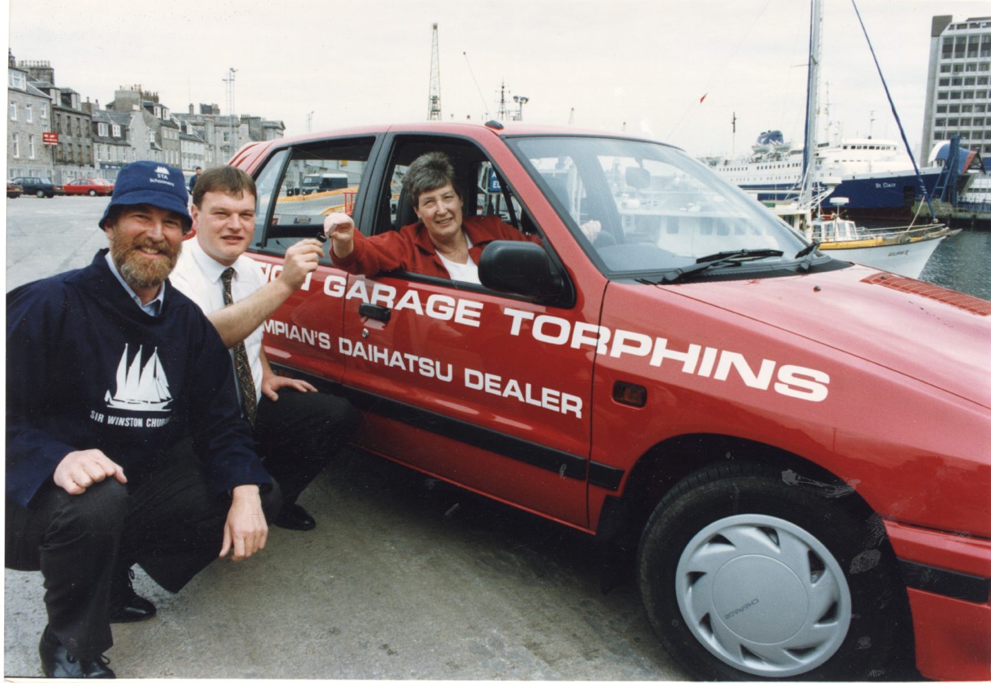 Bob Shepherd, partner at the Station Garage, Torphins, hands over the keys of the £8,500 car to Jean Durrant. 