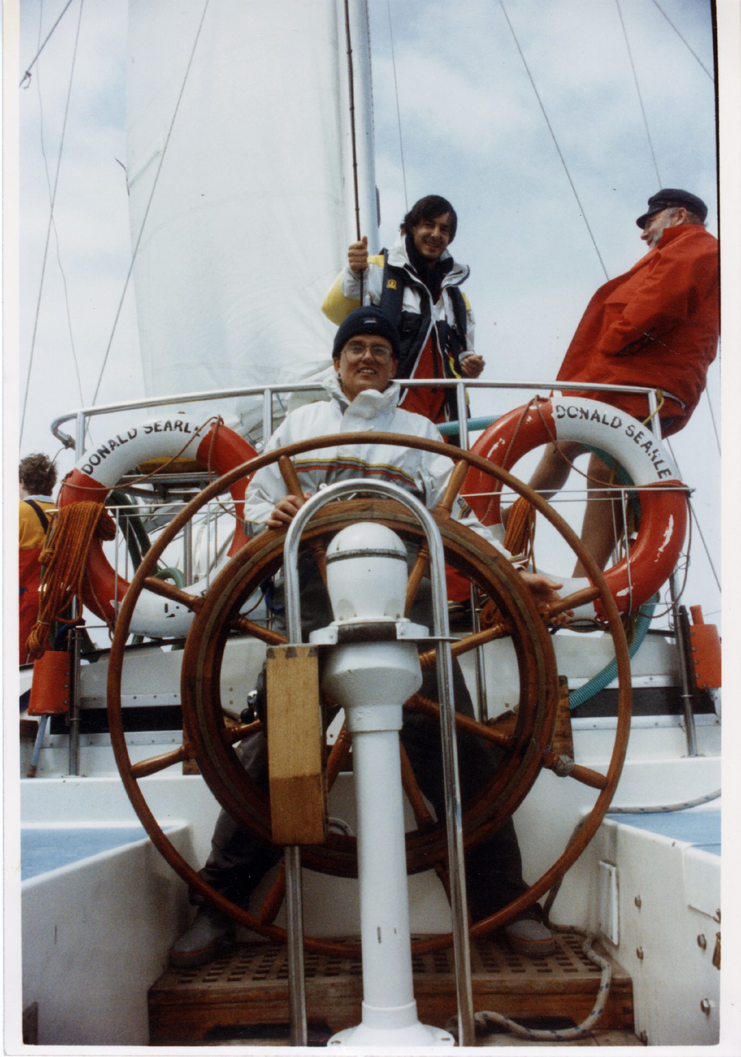 Three men on a boat