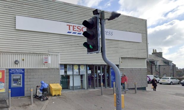 The man was robbed at the cash machine outside the Tesco on Great Northern Road, Aberdeen. Image: Google Street View