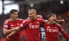 The Aberdeen players celebrate during the 3-2 win against Hearts. 
Image: Darrell Benns/DC Thomson