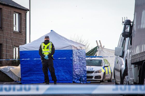 Location, Ives Road, Peterhead.
Scene of a suspected murder in Ives Road, Peterhead
Pictured is a police tent covering the scene
Monday, 6th, February 2023 
Image: Wullie Marr / DC Thomson