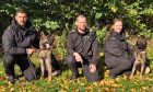 PC Lauren Cradock and PC Keith Whitelaw will oversee the training of Bella and Blue. With Dog Unit boss PS Adam McBean, centre. Image: Alberto Lejarraga/DC Thomson