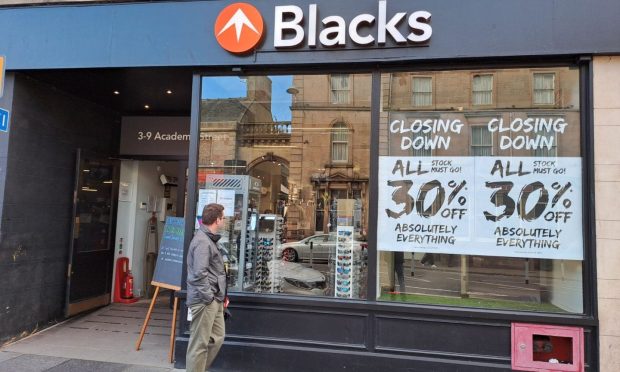 Closing down signs have been put up at the Blacks store on Academy Street.