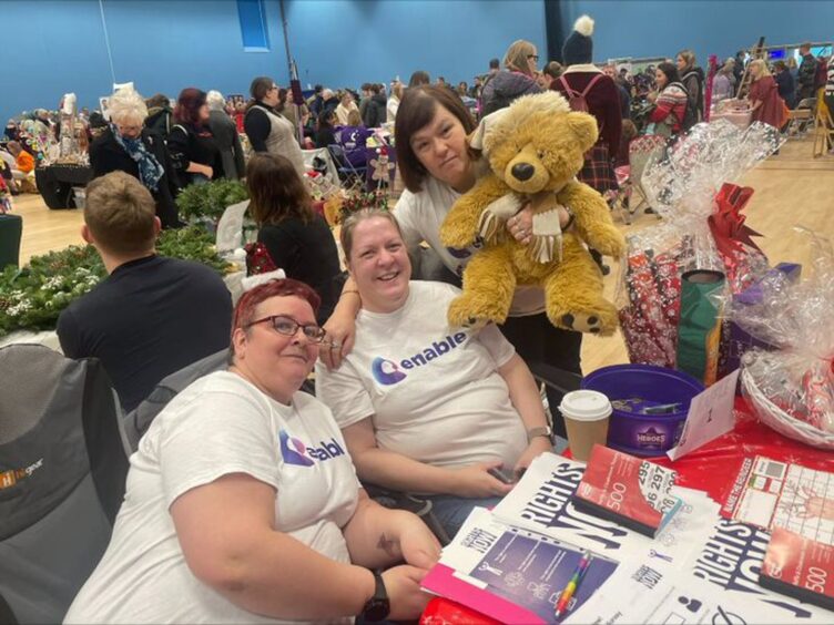 The team at Enable who were at last year's Elgin Giant Christmas market.