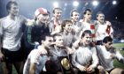 Aberdeen players celebrate winning the Uefa Super Cup after winning against SV Hamburg. Back row (l to r): Dougie Bell, Jim Leighton, John Hewitt, Alex McLeish, Neil Simpson, Peter Weir, Stewart McKImmie
Front row (l to r): Willie Miller, John McMaster, Gordon Strachan, Mark McGhee, Eric Black. Image: SNS