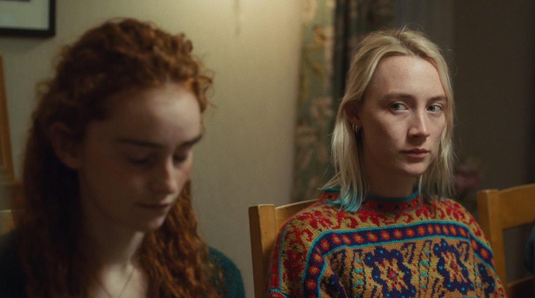 Eilidh Fisher with Saoirse Ronan in the Bible study group in The Outrun. 