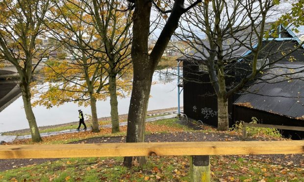 Police can be seen working in the area of Aberdeen Rowing Club.