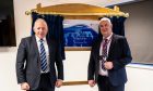 SSEN director of offshore development and delivery, Sandy MacTaggart with Councillor Raymond Bremner at the new Inverness offices. Image: SSEN Transmission