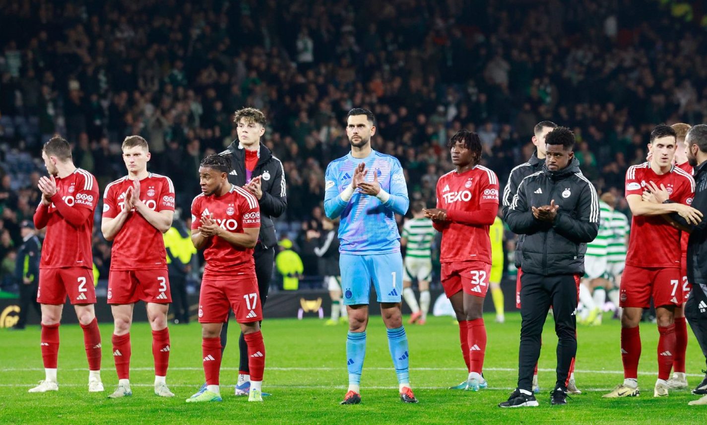 Aberdeen players applaud the fans at full time after the 6-0 Premier Sports Cup semi-final loss to Celtic at Hampden. Image: Shutterstock