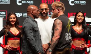 Boxing legend Mike Tyson(l) and Jake Paul (r) face off ahead of their bout. Image: Shutterstock