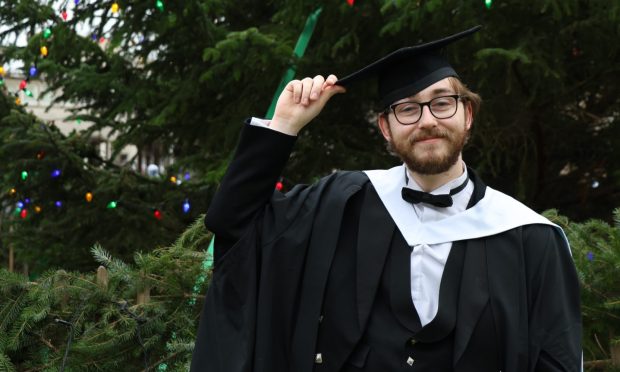 Euan McFarlane in his graduation cap and gown at Aberdeen University.