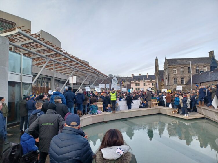 Farmers gather outside Holyrood