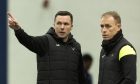 Ross County manager Don Cowie, left, with assistant boss Carl Tremarco. Image: SNS.