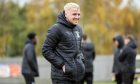 Caley Thistle winger Luis Longstaff smiling before a match.